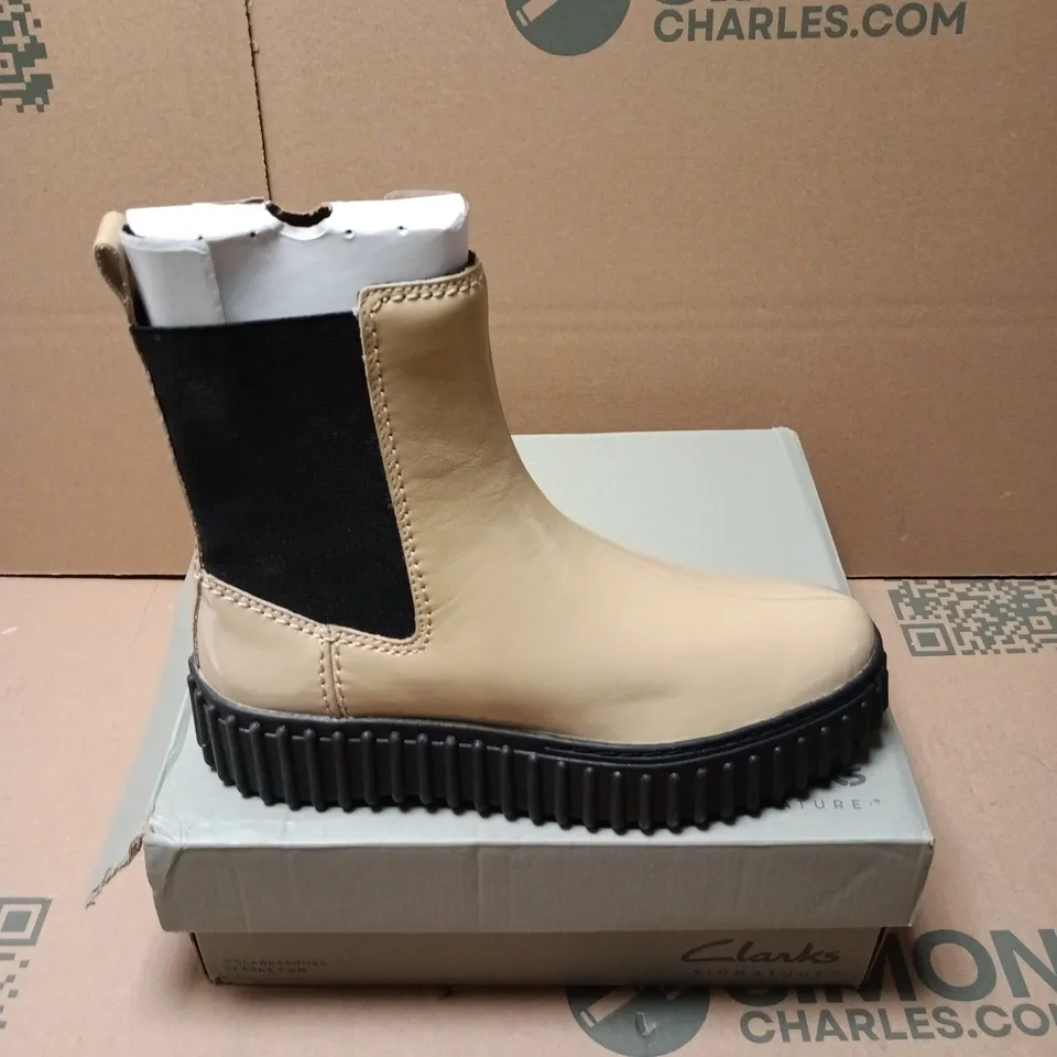 BOXED PAIR OF CLARKS TORHILL MAPLE BOOTS IN BEIGE PATENT - UK 4.5