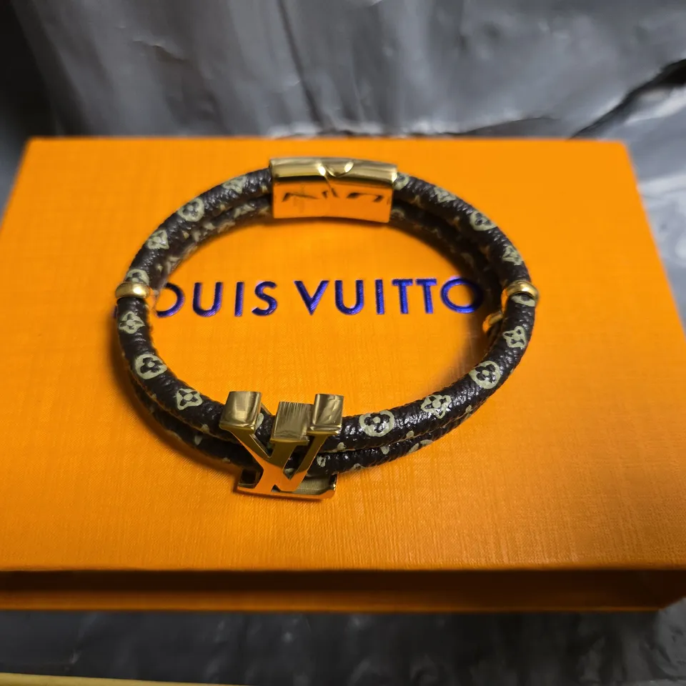 LOUIS VUITTON MONOGRAM BRACELET – BLACK FABRIC WITH GOLD HARDWARE 