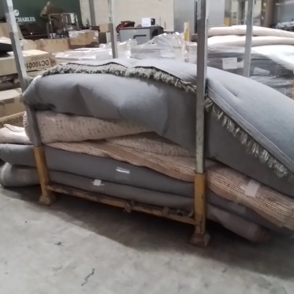 STILLAGE OF APPROXIMATELY 12 QUALITY DESIGNER RUGS