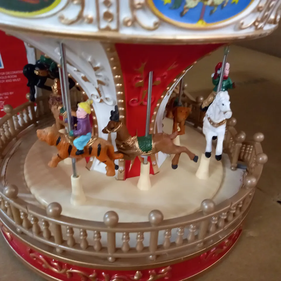 CHRISTMAS TURNING CAROUSEL SCENE WITH LED LIGHTS