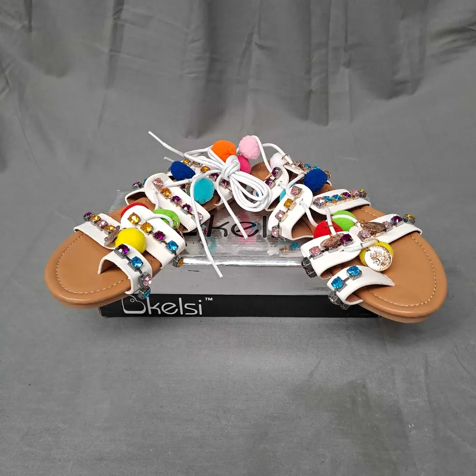 BOX OF APPROXIMATELY 8 PAIRS OF KELSI EMBELLISHED SANDALS IN WHITE - VARIOUS SIZES