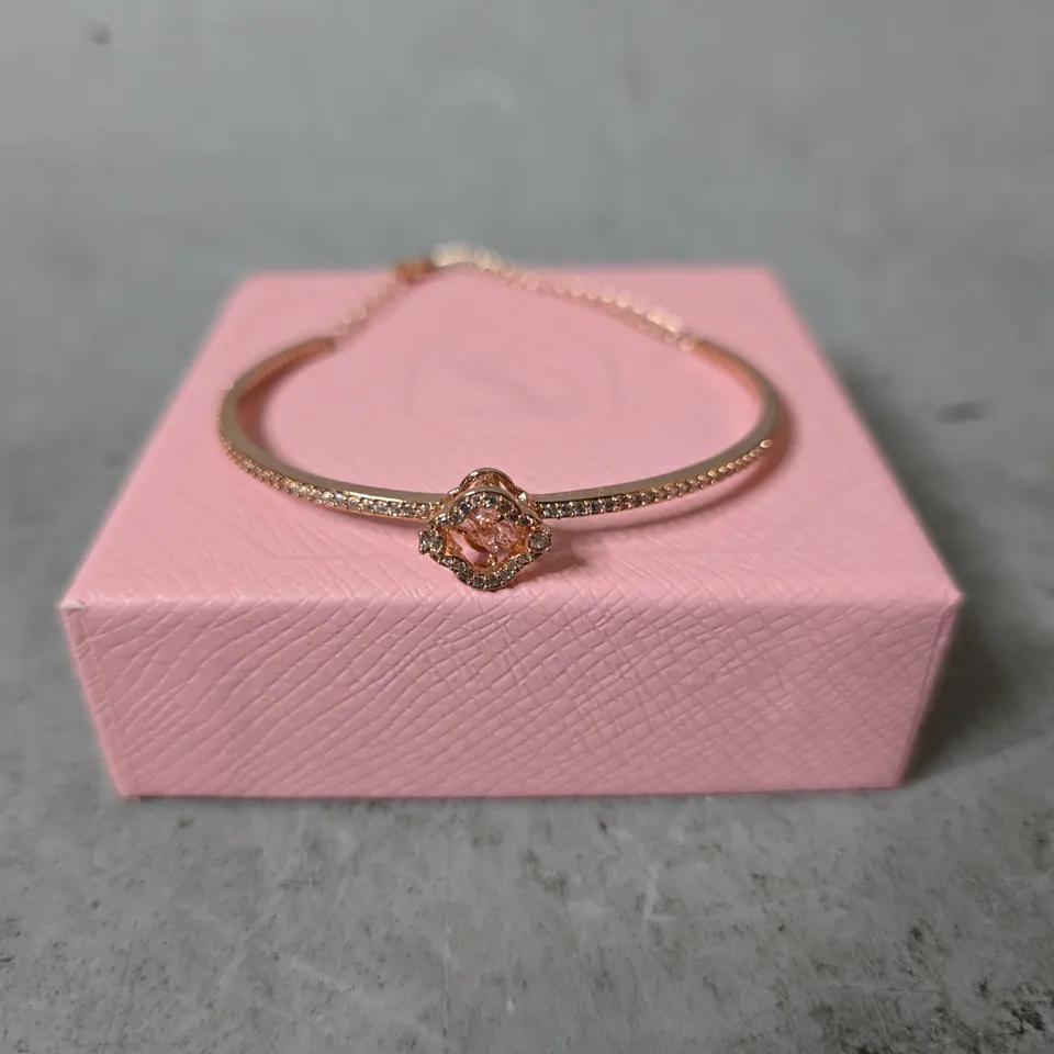 BOXED SWAROVSKI UNA BANGLE IN PINK ROSE GOLD 