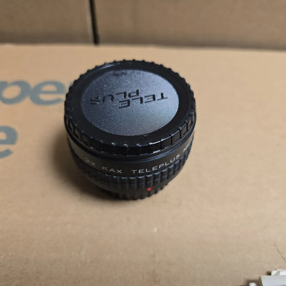 Vintage camera accessories bundle: Kako 818B flash, 2x Teleplus MC teleconverter, Vivitar/Canon lens caps & mounts