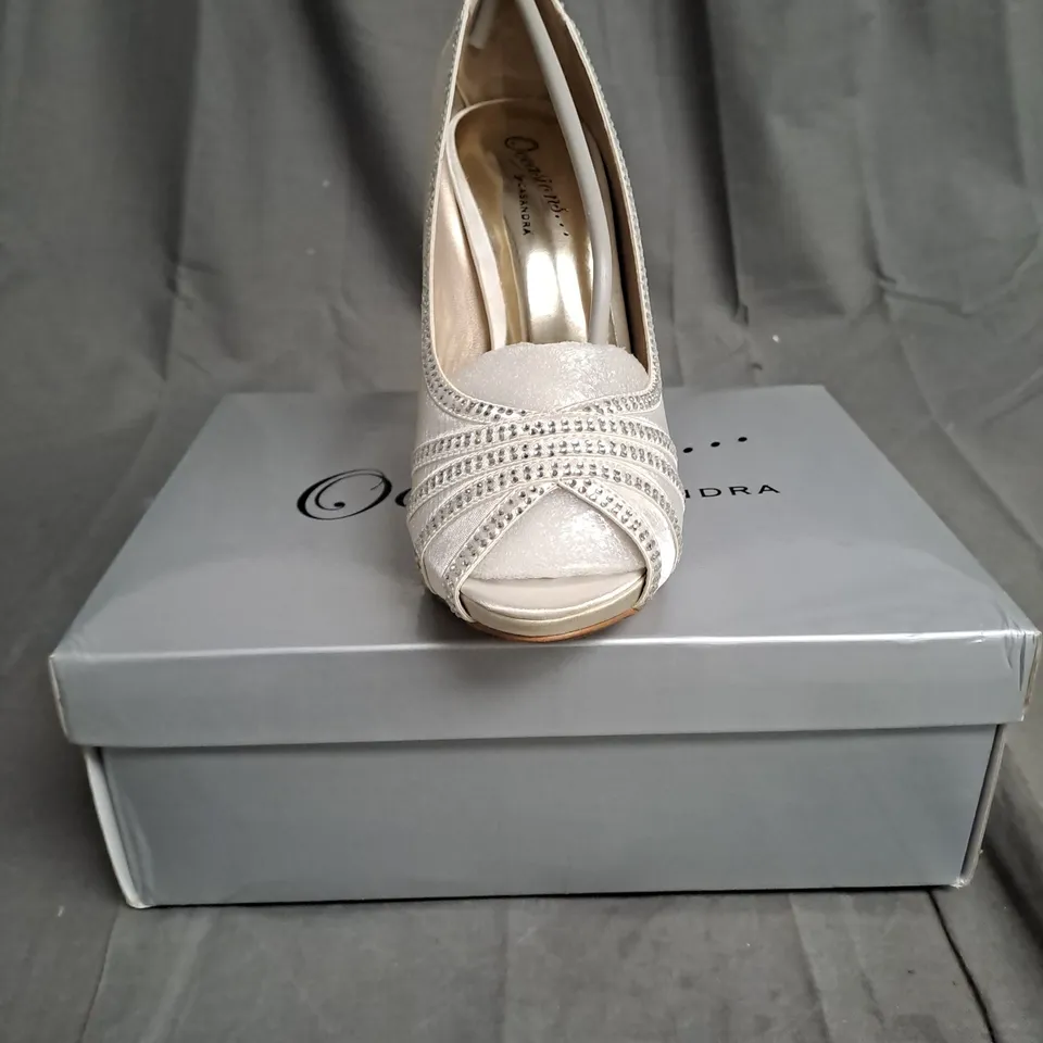 BOXED LOT OF 13 PAIRS OF LADIES OCCASIONS BY CASANDRA HIGH HEELED SHOES. VARIOUS SIZES