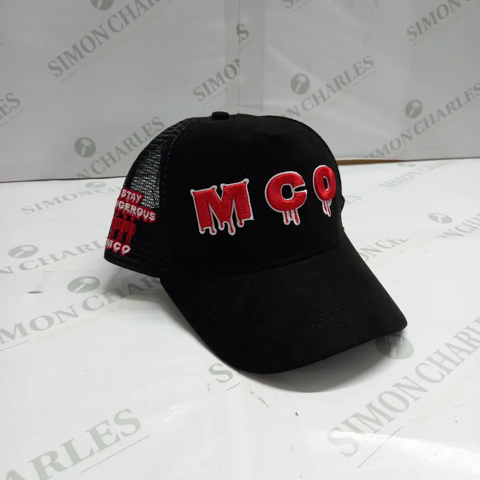 MCO STAY DANGEROUS TRUCKER CAP IN BLACK
