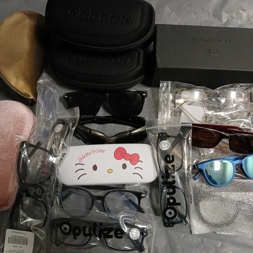 LOT OF APPROXIMATELY 30 ASSORTED PAIRS OF GLASSES AND CASES TO INCLUDE PROGEAR AND PULIZE