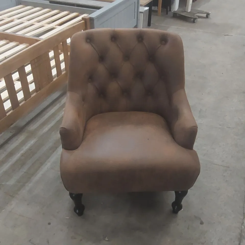 LUCIANA SUEDE TUFTED ARMCHAIR UPHOLSTERY COLOUR: BROWN
