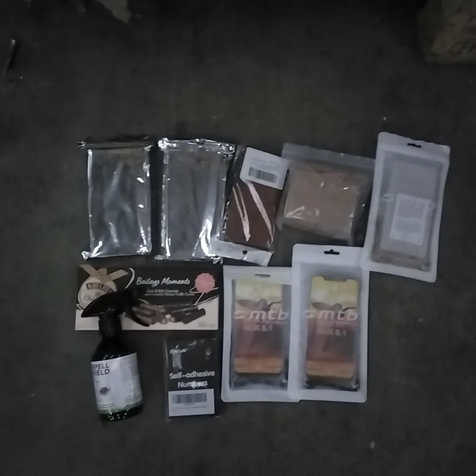 PALLET OF ASSORTED ITEMS INCLUDING SELF ADHESIVE NUMBERS, TICK REPELL SHIELD, KITCHEN APRON, BAILEYS CHOCOLATE, PARTY DECORATION SET, PHONE CASES