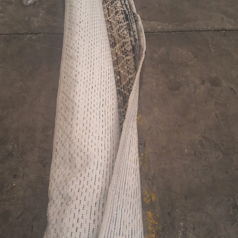 ROLLED PATTERN OVER WHITE RUG - APPROXIMATELY 230CM X UNSPECIFIED 