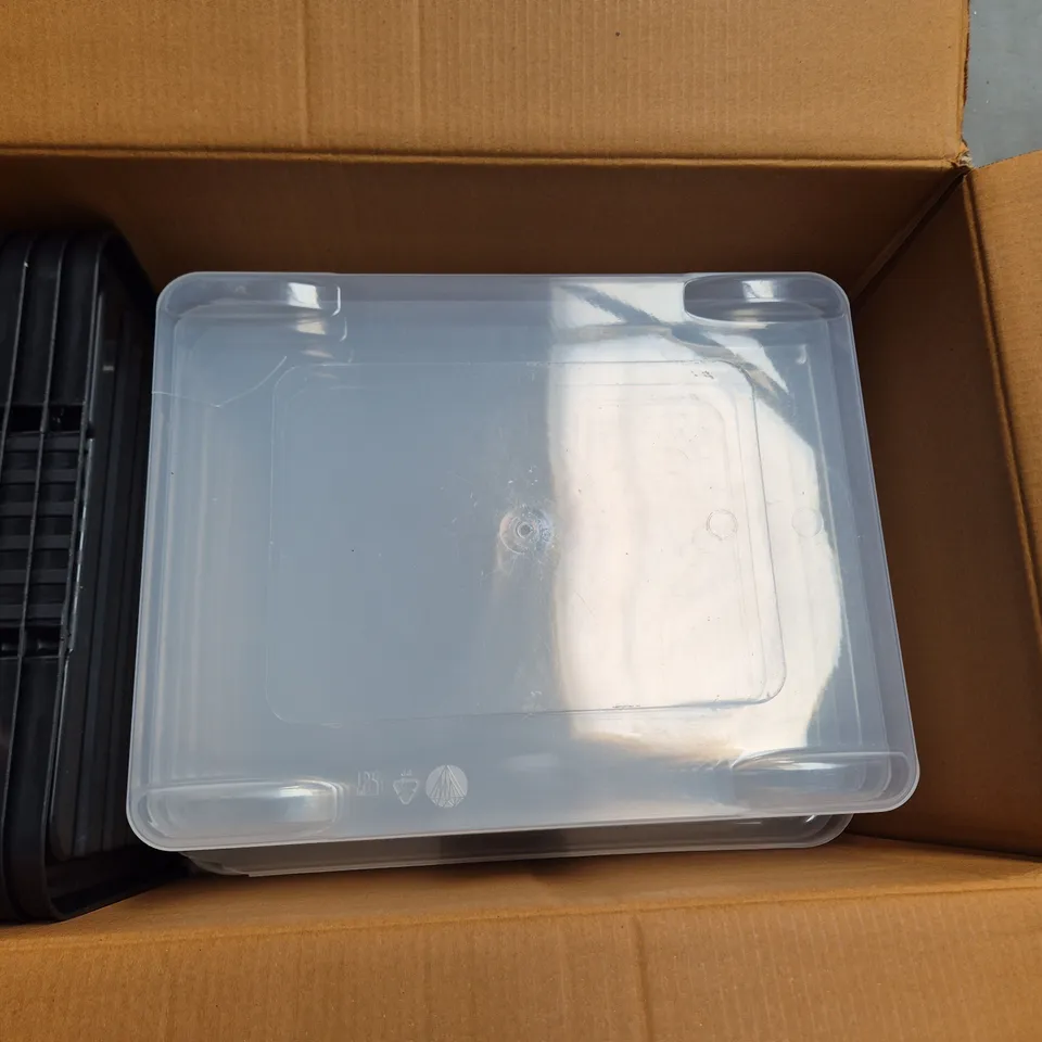 APPROXIMATELY 4 LARGE CLEAR PLASTIC STORAGE BOXES WITH LIDS