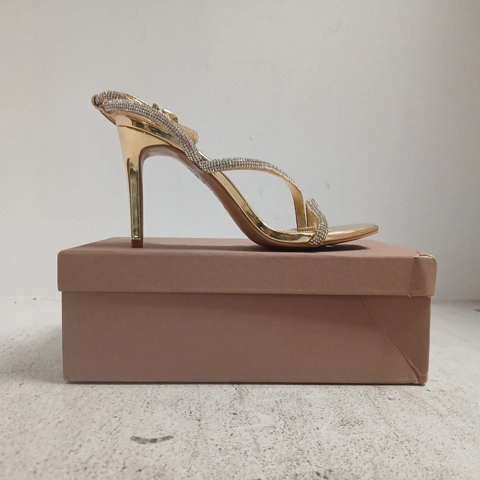 BOXED PAIR OF CARVELA OPEN TOE STILETTO HEELS IN METALLIC GOLD SIZE EU 40