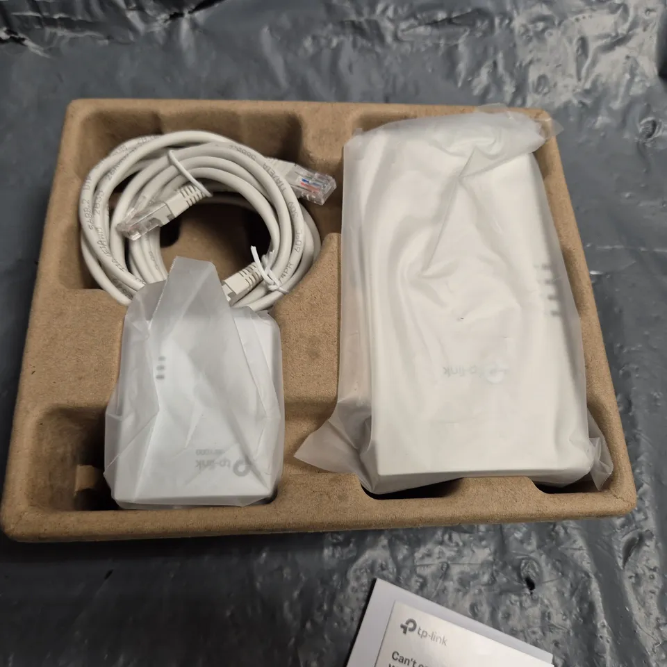 BOXED TP LINK POWERLINE WI-FI 6 EXTENDER