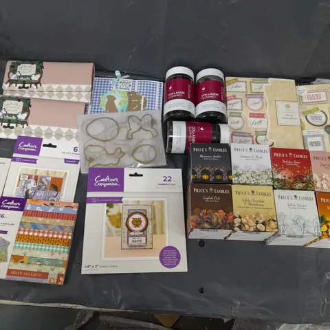 BOX OF APPROXIMATELY 12 ASSORTED ITEMS TO INCLUDE - CANDLES, STICKERS, AND COLLAGEN GUMMIES ETC.