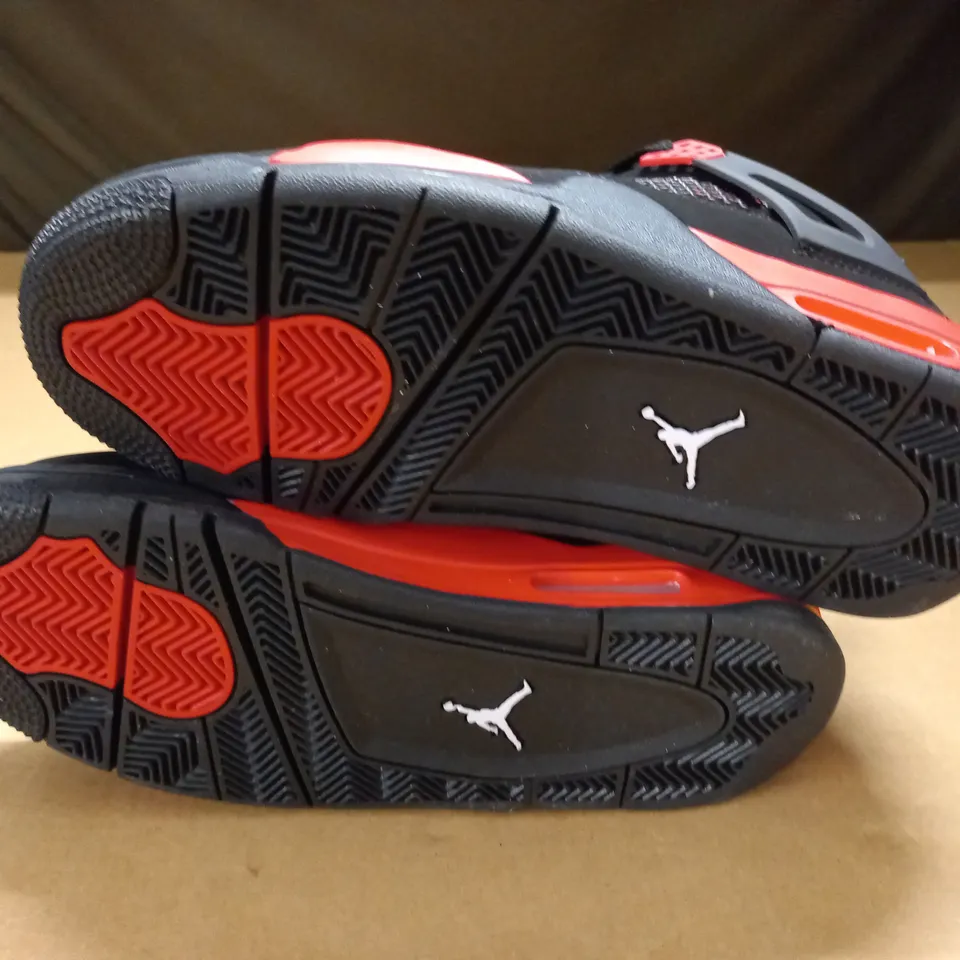 PAIR OF AIT JORDAN 4 RETRO TRAINERS IN BLACK/RED - UK 7