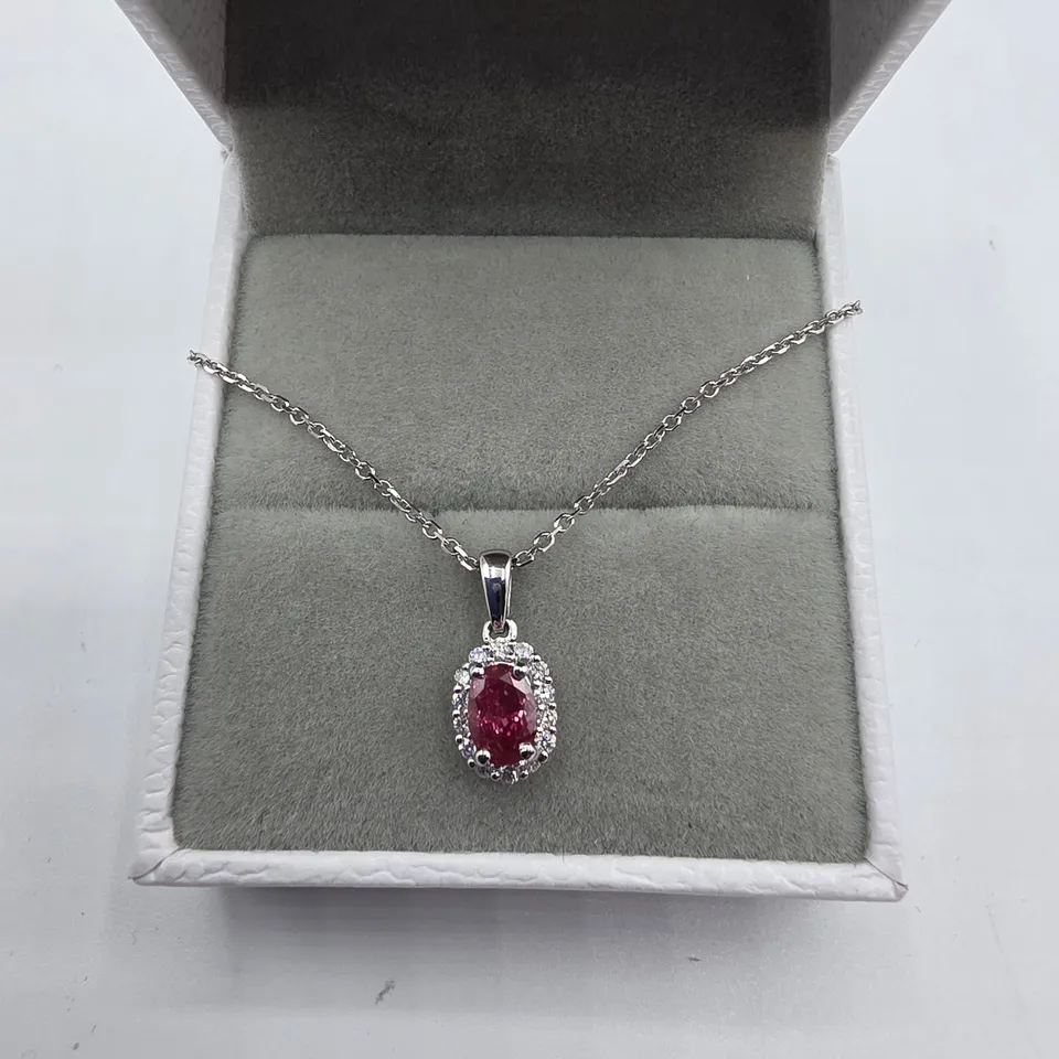 PLATINUM PENDANT ON CHAIN SET WITH AN OVAL CUT VIVID PI K LAB GROWN DIAMOND TO NATURAL DIAMOND HALO