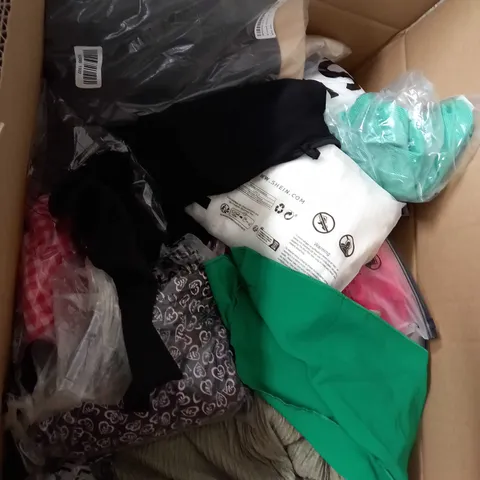 BOX OF ASSORTED CLOTHING ITEMS TOO INCLUDE DRESSES , SHIRTS AND TROUSERS IN VARIOUS SIZES AND COLOURS