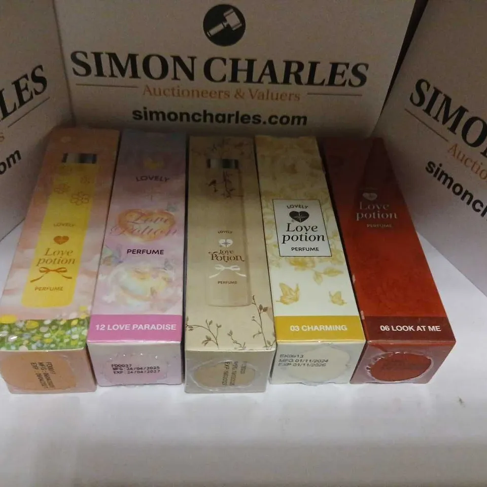 APPROXIMATELY 11 ASSORTED LOVELY LOVE POTION PERFUME 10ML