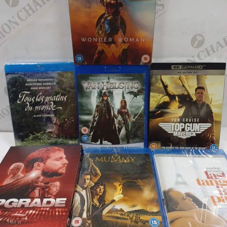 LOT TO CONTAIN 7 X BLU-RAYS, & DVD'S, INCLUDES TOP GUN, WONDER WOMAN, VAN HELSING ETC 