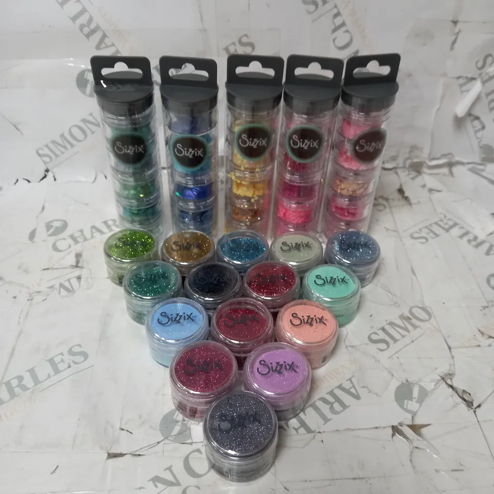 BOX OF APPROX 20 ASSORTED SIZZIX ITEMS TO INCLUDE VARIOUS BIODEGRADEABLE FINE GLITTER, VARIOUS SEQUINS AND BEAD TUBES.
