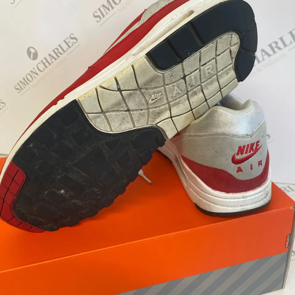BOXED PAIR OF NIKE RED/GREY SIZE 9 TRAINERS 