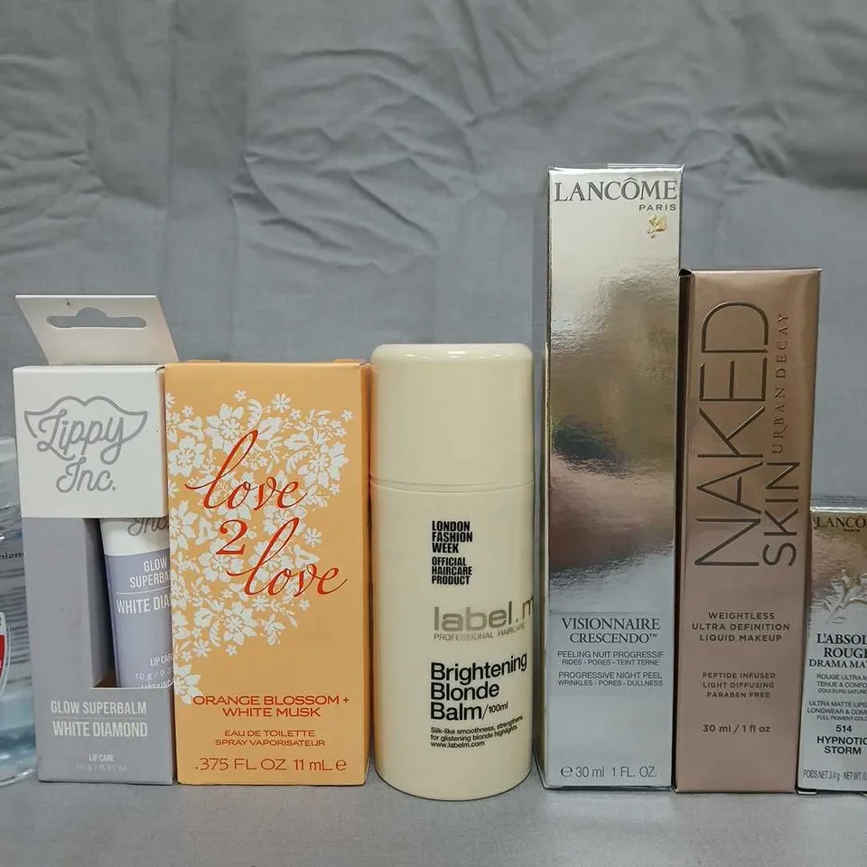 APPROXIMATELY NINE ASSORTED COSMETICS PRODUCTS TO INCLUDE; 