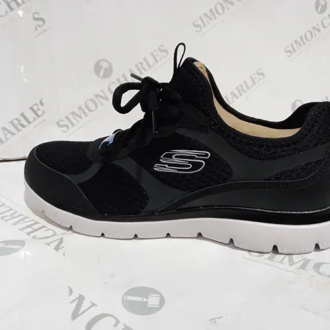 black sketchers trainers size 6