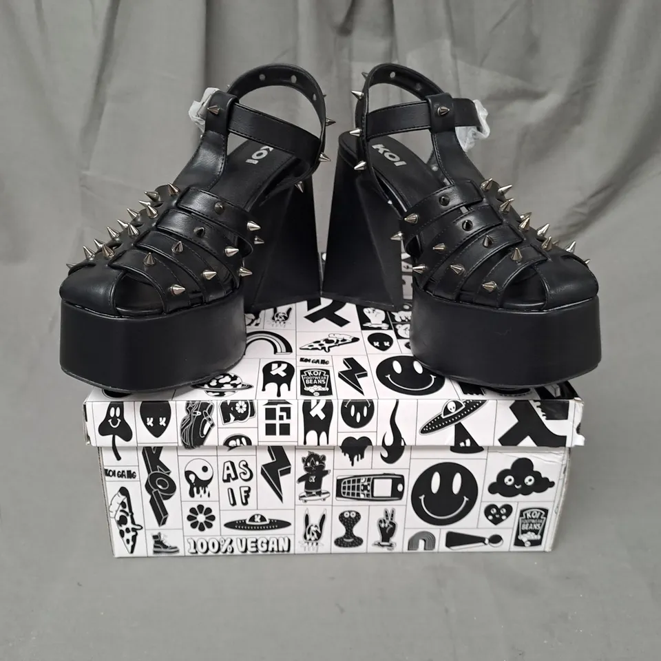 BOXED PAIR OF KOI VEGAN ANGEL MIST PLATFORM HEELS IN BLACK UK SIZE 6