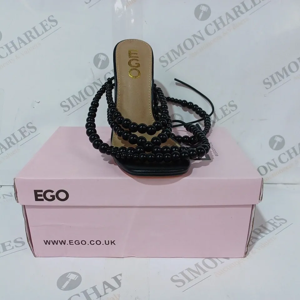 BOXED PAIR OF EGO OPEN TOE HIGH HEEL SANDALS IN BLACK W. BEADED EFECT UK SIZE 4