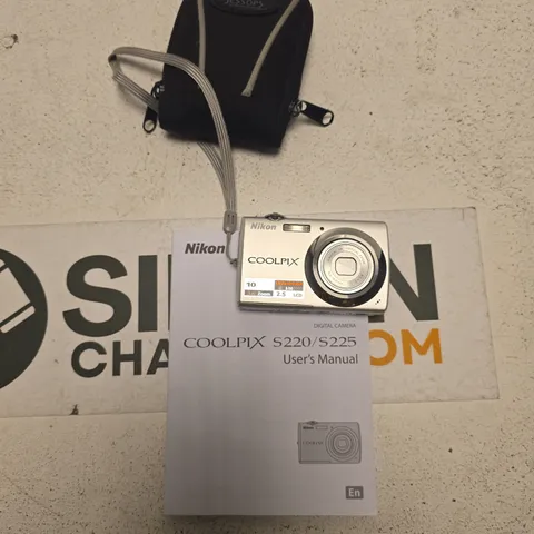 NIKON COOLPIX S220/S225 DIGITAL CAMERA WITH CASE, CHARGER & MANUALS (SILVER)