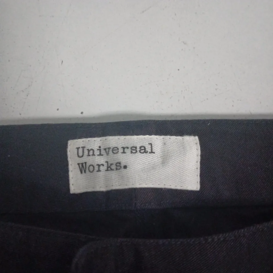 UNIVERSAL WORKS TWILL CURVED TROUSERS – BLACK, UK 32