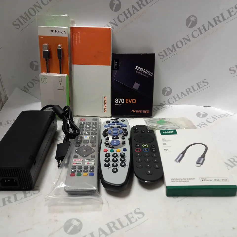 LOT OF ASSORTED ELECTRICAL ITEMS TO INCLUDE REMOTE CONTROLS, AUDIO ADAPTER AND USB CABLE 