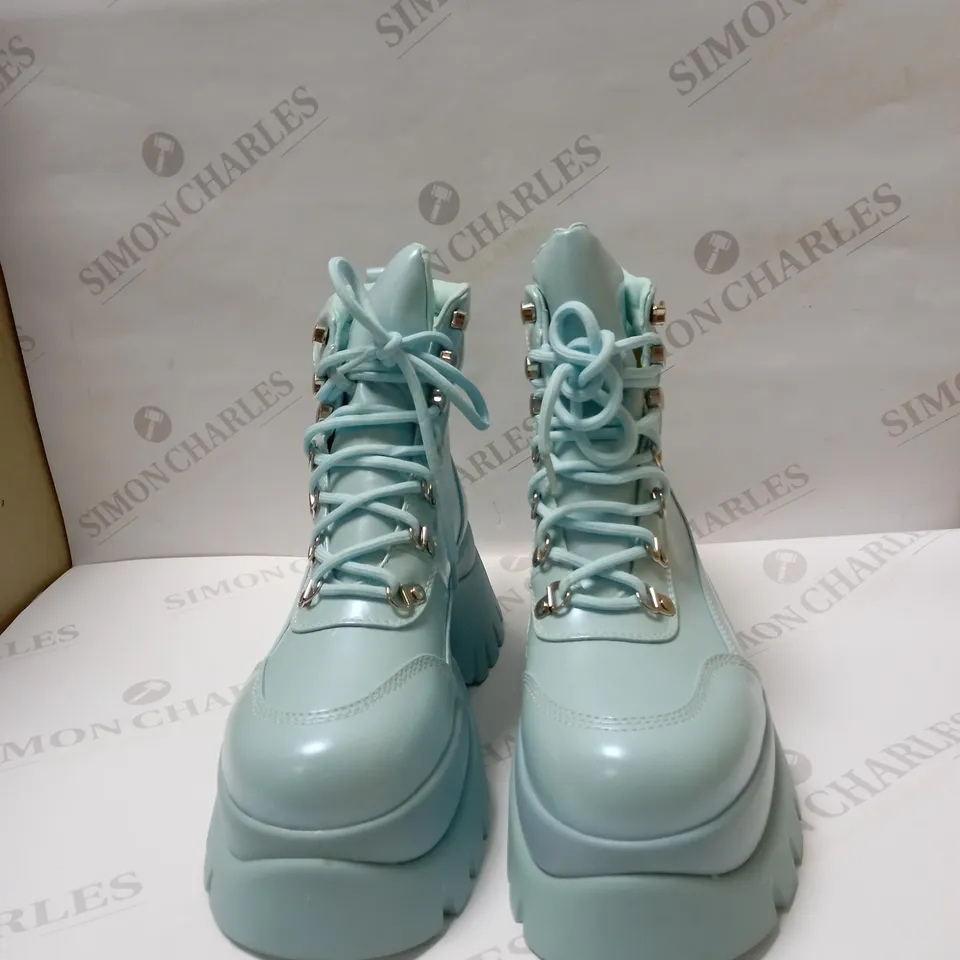 DESIGNER KOI VEGAN GOOGEY BABY BLUE PLATFORM BOOTS