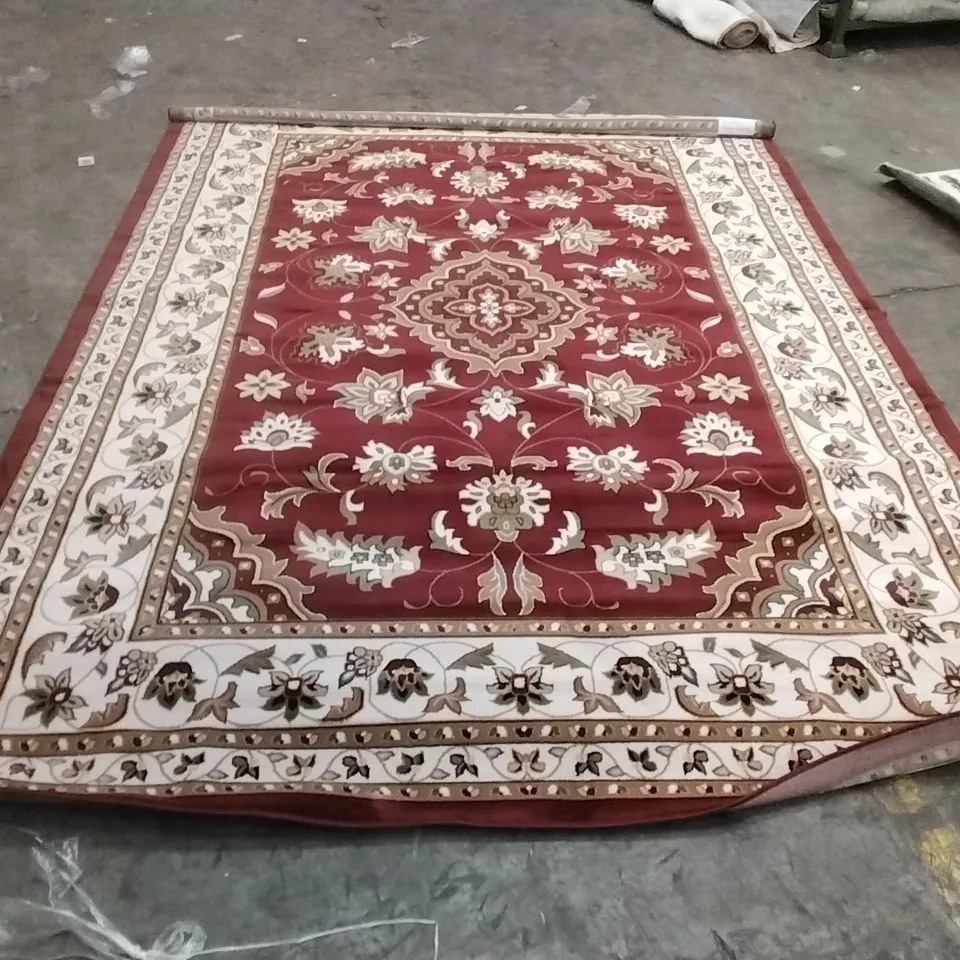 STILLAGE OF APPROXIMATELY 20 DESIGNER RUGS