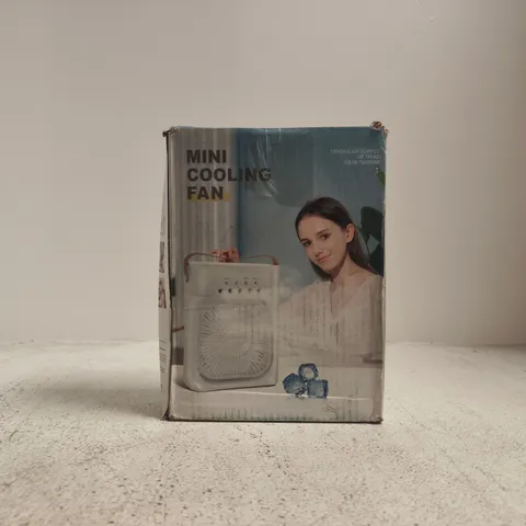 BOXED UNBRANDED MINI COOLING FAN IN WHITE