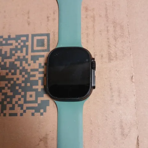 SMARTWATCH WITH TEAL SILICONE STRAP