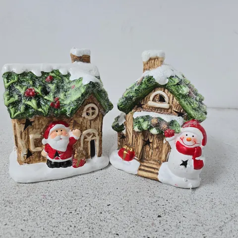 FESTIVE SET OF 2 LIT CERAMIC SANTA/SNOWMAN HOUSE CHRISTMAS DECORATIONS 