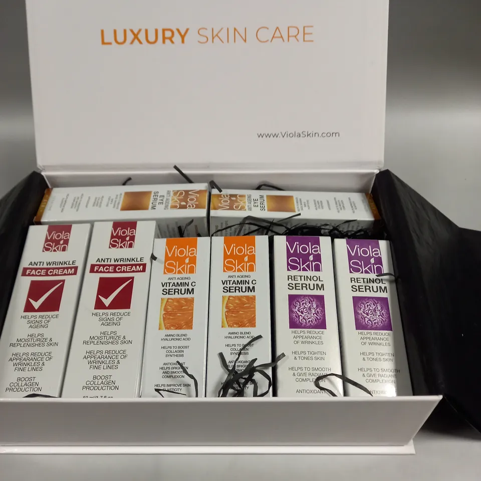 BOXED VIOLA SKIN CARE FACE CREAM, VITAMIN C SERUM, RETINOL SERUM, AND EYE SERUM 
