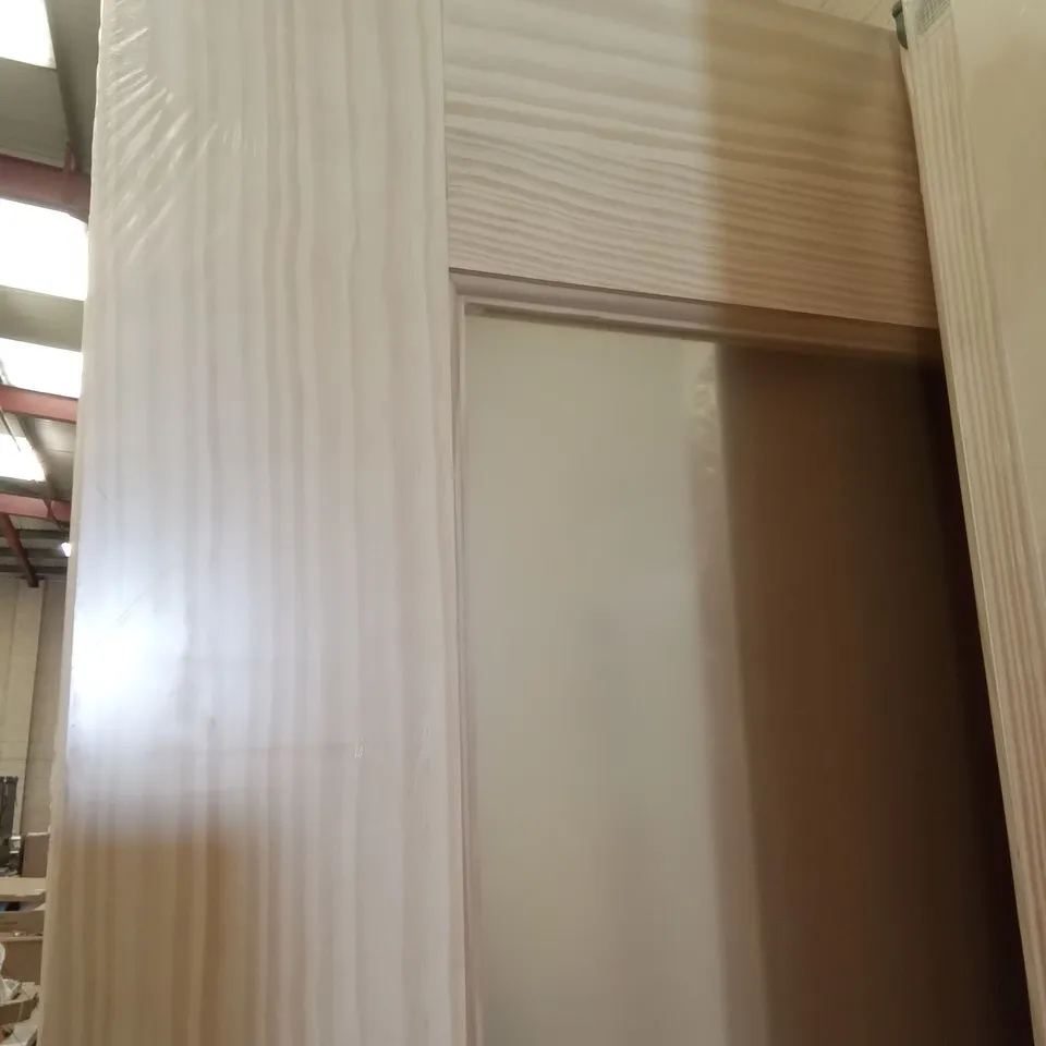 PACKAGED 1981 X 686MM 2 PANNEL CLEAR PINE GLAZED INTERNAL DOOR