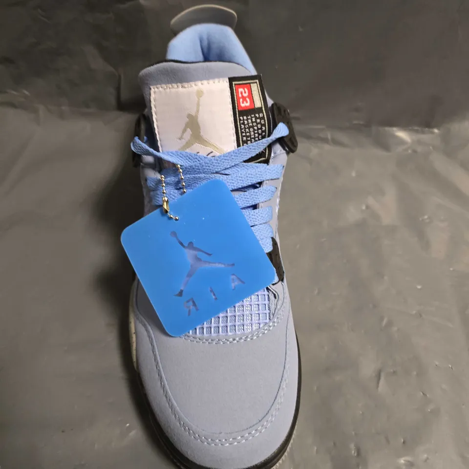 PAIR OF NIKE AIR JORDAN 4 RETRO UNIVERSITY BLUE - UK SIZE 7