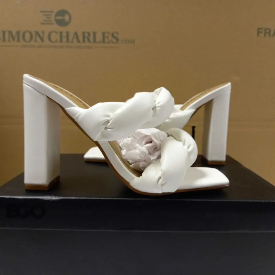 BOXED PAIR OF EGO WHITE WAVELY BLOCK HEEL TWIST SANDALS - SIZE 4