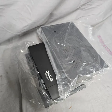 box of assorted cables and modems