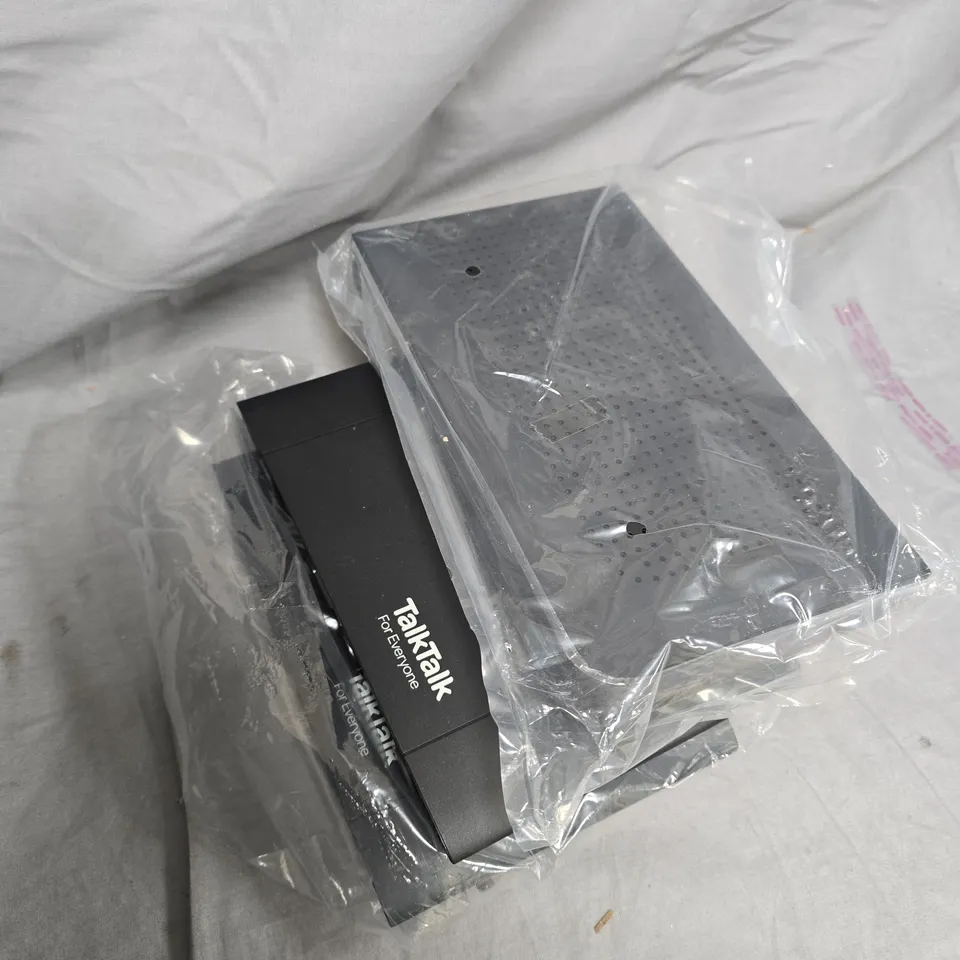 box of assorted cables and modems