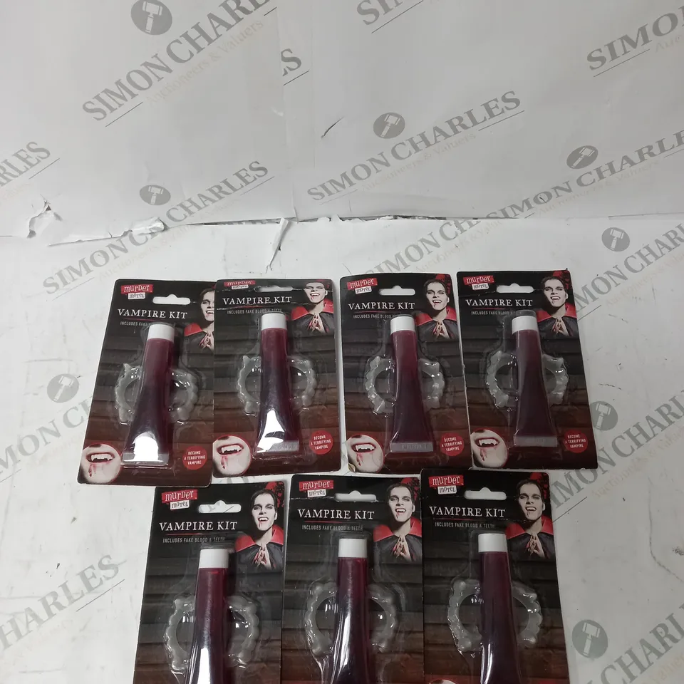 BOX OF APPROX 7 VAMPIRE FAKE BLOOD AND TEETH KIT.