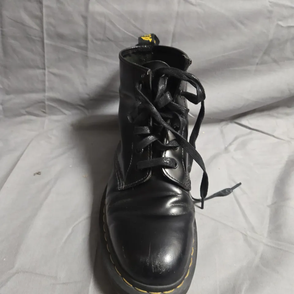 BOXED PAIR OF DR.MARTENS CAMO BOOTS - UK SIZE UNSPECIFIED