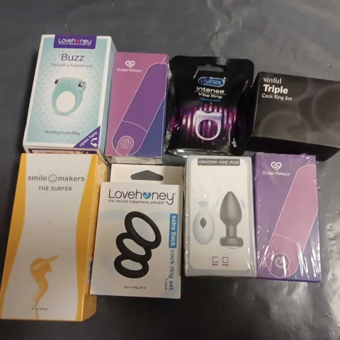 LOT OF 8 ASSORTED SEXUAL PLEASURE ITEMS TO INCLUDE PENIS RINGS, ANAL PLUG AND THE SURFER VIBRATOR