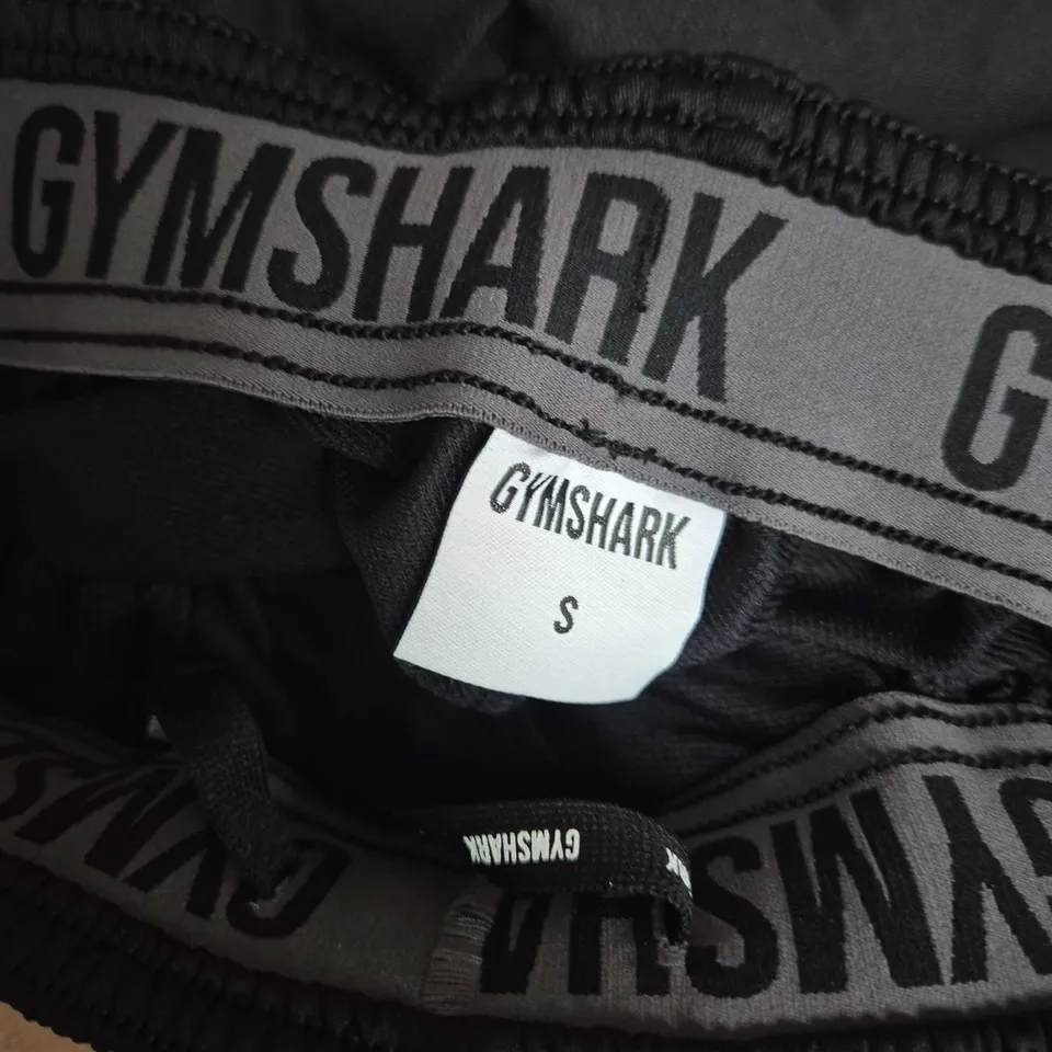GYMSHARK LOGO TRACKSUIT BOTTOMS IN BLACK - SMALL
