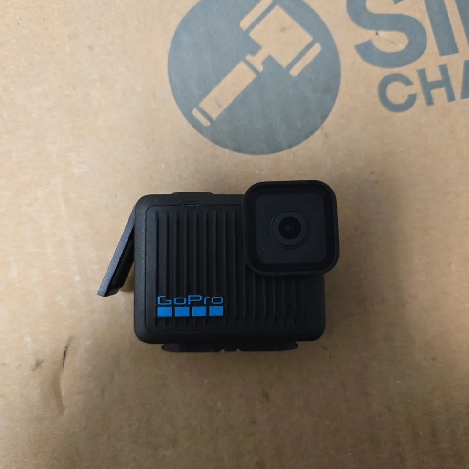 GOPRO HERO ACTION CAMERA WITH PROTECTIVE HOUSING AND MOUNTING ACCESSORIES