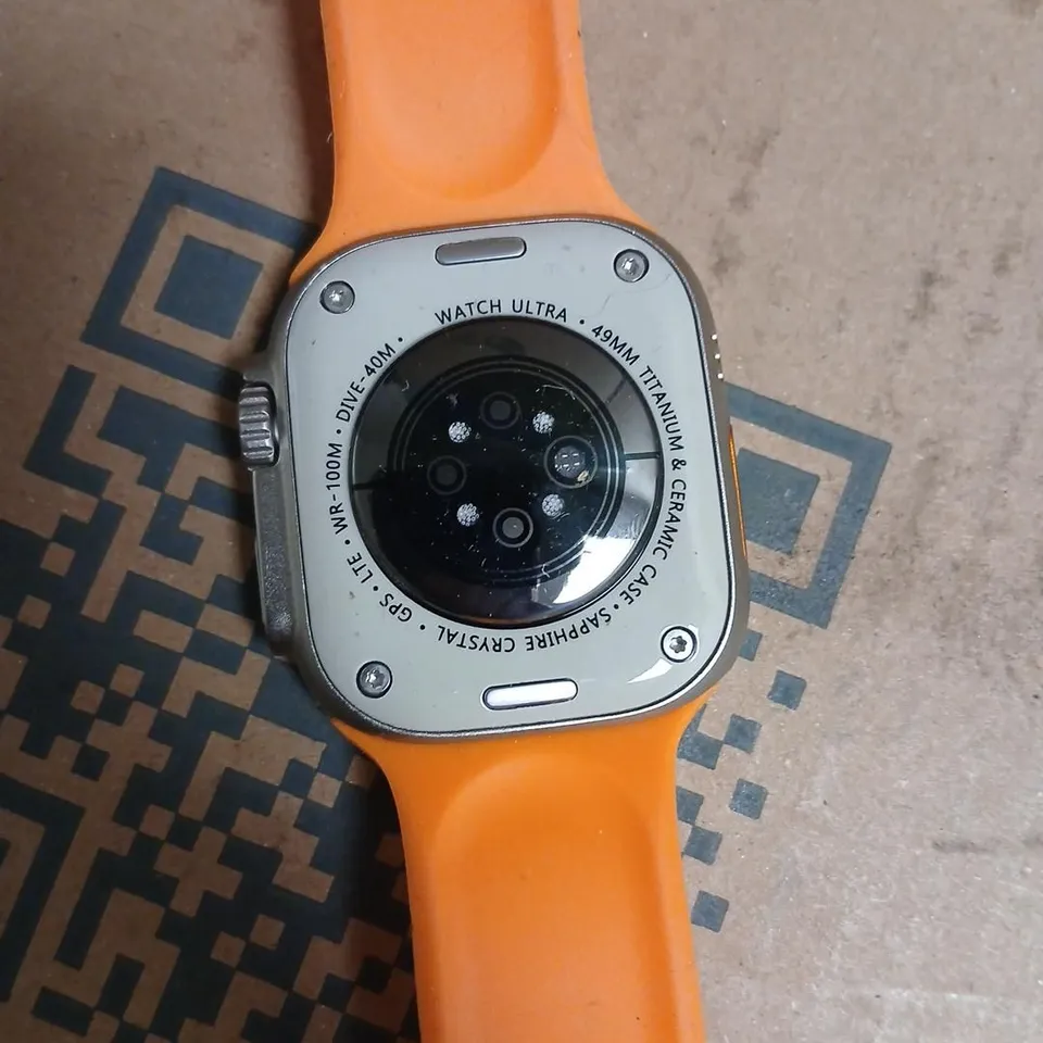SMART WATCH ULTRA 49MM TITANIUM & CERAMIC CASE – ORANGE BAND (GPS)