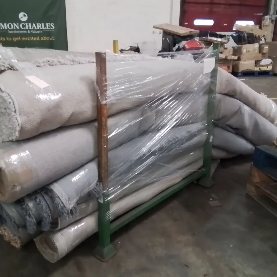 STILLAGE OF APPROXIMATELY 15 QUALITY DESIGNER RUGS