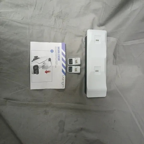 PLAYSTATION 5 DOCKING STATION WITH TWO MODULAR ADAPTERS.
